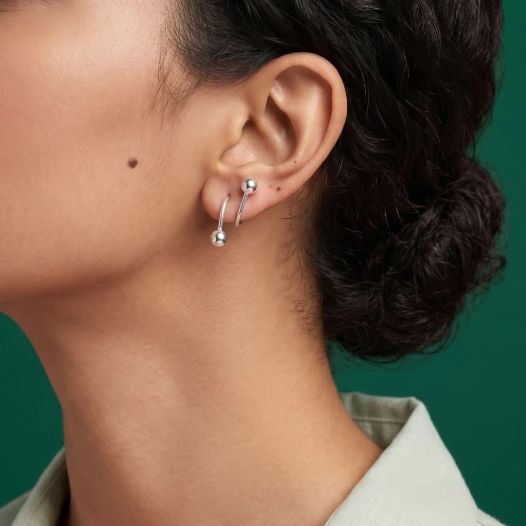 Sleek Silver Ear Climbers