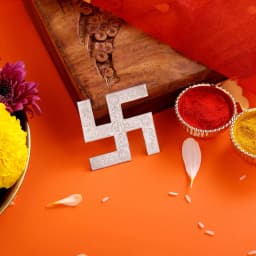 Pure Silver Swastik and Silver Paduka Set